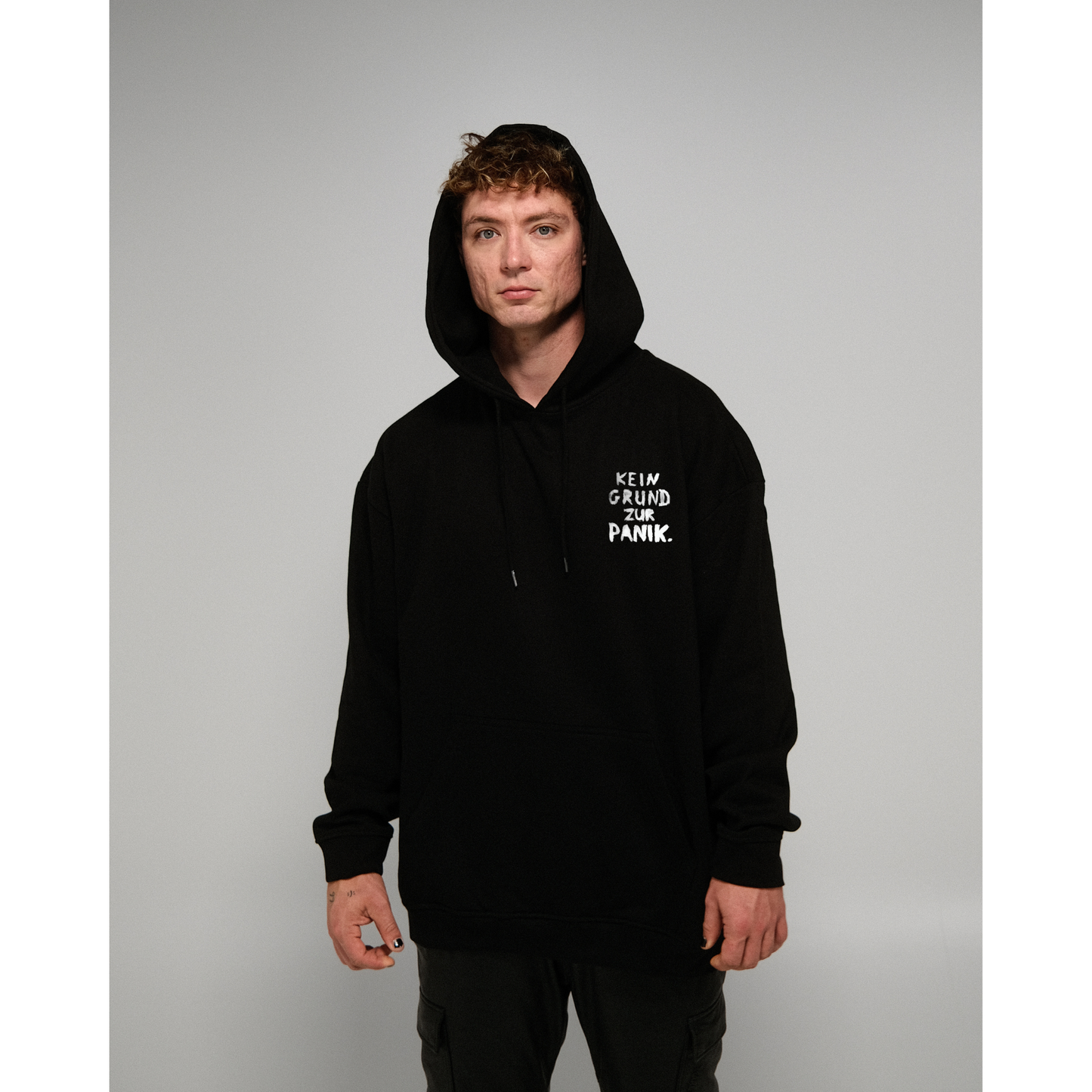 Oversize Hoodie "Kein Grund zur Panik" schwarz