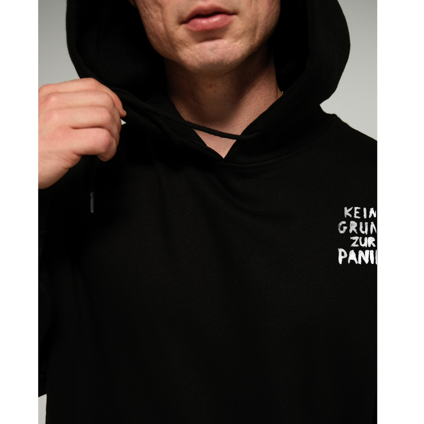 Oversize Hoodie "Kein Grund zur Panik" schwarz